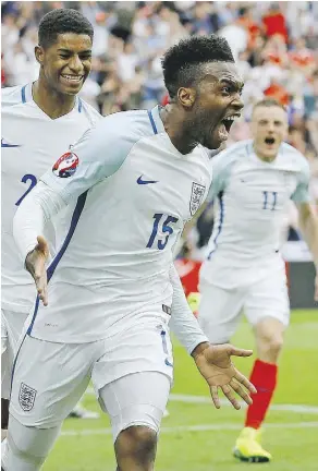  ?? CLIVE ROSE/GETTY IMAGES ?? Daniel Sturridge of England finds pay dirt with the winning goal in their 2-1 win over Wales on Thursday in Lens, France.