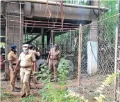  ??  ?? Policemen inspecting the industry premises in Salem on Monday