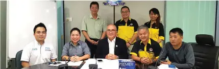  ??  ?? (Seated, from second left) Councillor Warzieda Ahmad, Yii, Wong and other members in a photo call after the press conference.