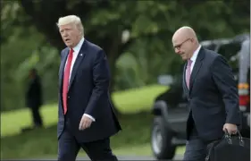 ?? PHOTO/SUSAN WALSH ?? President Donald Trump walks with National Security Adviser H.R. McMaster from the Oval Office to Marine One on the South Lawn of the White House in Washington on Friday for a short trip to Andrews Air Force Base, Md., then onto Miami. AP