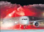  ?? AFP ?? Air India flight AI 139 receives a water cannon salute upon its arrival at Ben Gurion Internatio­nal Airport, Israel.