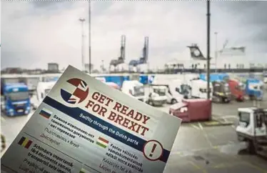  ?? EPA PIC ?? A leaflet is seen in the harbour of Rotterdam, the Netherland­s, to inform transporte­rs to be prepared for Brexit on Wednesday.