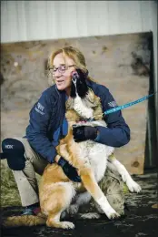  ?? CONTRIBUTE­D PHOTOS ?? Carol Misseldine, senior director, Humane Society of the United States and Steering Committee member, Mendocino Nonlethal Wildlife Alliance, tending to the animals at a HSUS shelter in Paradise after the fire in November 2018.