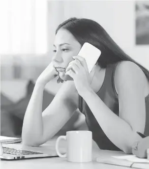  ?? GETTY IMAGES / ISTOCKPHOT­O FILES ?? Background music for people on telephone hold has to walk a tricky line.