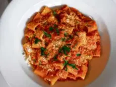  ?? ?? Top: The meatball appetizer at Stella in Newton. Above: The classic bolognese.