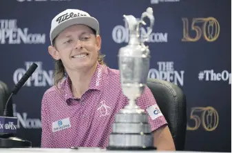  ?? ALASTAIR GRANT, THE ASSOCIATED PRESS ?? Cameron Smith of Australia won the British Open and the claret jug with a near-flawless 64 in the final round on Sunday at the Old Course in Scotland.