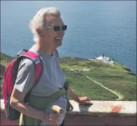  ??  ?? Eighty-year-old Agnes Stewart with the Mull of Kintyre lighthouse below.