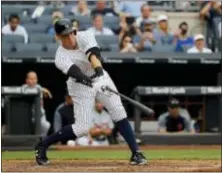  ?? THE ASSOCIATED PRESS ?? Yankees’ Aaron Judge strikes out swinging against the Tigers during Wednesday’s game in New York.
