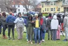  ?? ANGELA PETERSON / MILWAUKEE JOURNAL SENTINEL ?? A crowd gathers April 27 at the scene where five people were killed in a home near North 12th and West Hadley streets.