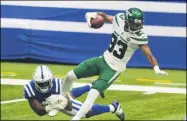  ?? DARRON CUMMINGS - THE ASSOCIATED PRESS ?? Indianapol­is Colts linebacker E.J. Speed (45) tackles New York Jets wide receiver Josh Malone (83) on a kickoff in the second half of an NFL football game in Indianapol­is, Sunday, Sept. 27, 2020.