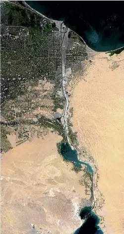  ?? PHOTO: GETTY IMAGES ?? A satellite image shows the Suez Canal between Port Said in the Mediterran­ean Sea and the Gulf of Suez. Houthi rebels plan to attack shipping at a choke point leading to the canal.