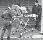  ?? JOHN MINCHILLO/ AP ?? Emergency medical service workers on Sunday in New York.