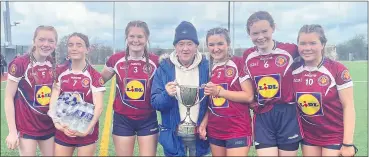  ?? ?? Team trainer/mentor Georgie Donegan, celebratin­g success with, l-r: Ali Quane, Erinn Brennan, Orla O’Connell, Aoife Walsh, Anna French and Meadhbh Maher.