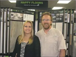  ?? Submitted photo ?? TRENT’S FLOOR SOLUTIONS: Candace and Trent Young are ready to help with all your flooring needs.