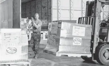  ?? U.S. Southern Command ?? The U.S. Southern Command on Thursday coordinate­d its second flight in two days to Toussaint Louverture Internatio­nal Airport in Port-au-Prince, Haiti, with a humanitari­an aid delivery. It was an important step toward the resumption of flights into Haiti. A U.S. Air Force C-130 transport plane delivered 20 pallets of oral rehydratio­n fluid.