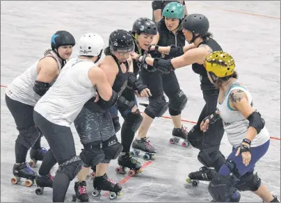  ?? JASON SIMMONDS/ JOURNAL PIONEER ?? The Twisted Sisters work on a drill during a team practice Wednesday night. The Twisted Sisters will host their season- opening bout at The Plex in Slemon Park on Saturday at 7 p. m.