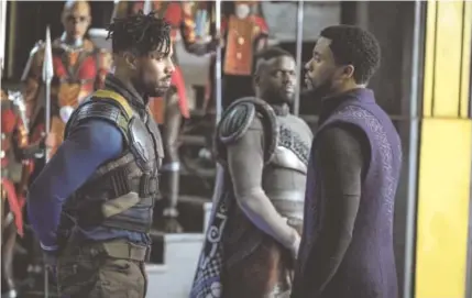  ?? MATT KENNEDY/ MARVEL STUDIOS ?? Michael B. Jordan and Chadwick Boseman, from left, with Daniel Kaluuya in the background, in “Black Panther.”