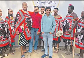  ?? ?? Some members of Eswatini cultural team posing with Indians during the Surajkund Internatio­nal Crafts Mela, held in Faridabad.