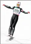  ??  ?? Daniel Andre Tande of Norway celebrates after his final jump to win the team competitio­n at the Ski Flying World Championsh­ips in Oberstdorf, Germany on Jan 21. (AP)