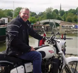  ?? PHOTO: TIM COGHLAN ?? Trevor on his Indian-built 1977 Royal Enfield which he plans to ride overland to India in August 2021, with his wife Sue riding pillion from Nepal to southern India.