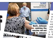  ?? ?? Boris Johnson watches the vaccine roll out in January