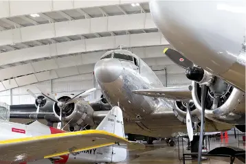  ?? Staff photo by Joshua Boucher ?? n Vintage planes are on display Friday at the Mid-America Flight Museum in Mount Pleasant, Texas. The new museum features flyable aircraft built between 1925-1955.