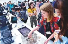  ?? Pictures: Clint Egbert/Gulf News ?? The fourth edition of the Global Grad Show is drawing hundreds of tech enthusiast­s to Dubai Design District.