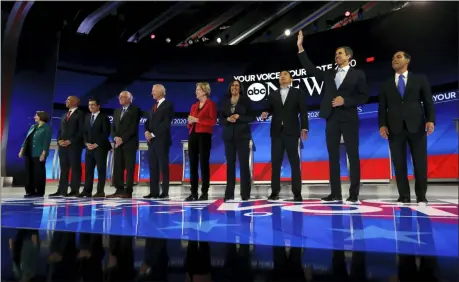  ?? ERIC GAY — THE ASSOCIATED PRESS ?? From left, Democratic presidenti­al candidates Sen. Amy Klobuchar, D-Minn., Sen. Cory Booker, D-N.J., South Bend Mayor Pete Buttigieg, Sen. Bernie Sanders, I-Vt., former Vice President Joe Biden, Sen. Elizabeth Warren, D-Mass., Sen. Kamala Harris, D-Calif., entreprene­ur Andrew Yang, former Texas Rep. Beto O’Rourke and former Housing Secretary Julian Castro are introduced for the Democratic presidenti­al primary debate hosted by ABC on the campus of Texas Southern University Thursday in Houston.