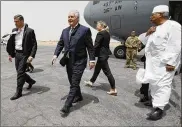  ?? JONATHAN ERNST / POOL VIA AP ?? U.S. Secretary of State Rex Tillerson arrives at N’Djamena Internatio­nal Airport in N’Djamena, Chad, on Friday.