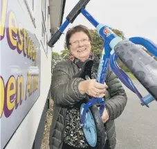  ?? ?? Centre manager Bernie Brown launches the Christmas bike appeal.