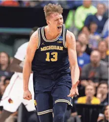  ?? BRIAN SPURLOCK, USA TODAY SPORTS ?? “Why not us?” asks Moritz Wagner, who had 26 points in Michigan’s victory.