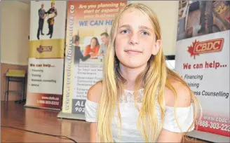  ?? ERIC MCCARTHY/JOURNAL PIONEER ?? Kaylynn Veniot reflects on the success of her summer business partnershi­p. She and her friend, Alana Burden had fun making and selling slime, one of the most popular of the West Prince Young Millionair­es products this summer.