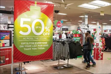  ?? DUSTIN FRANZ PHOTOS FOR THE WASHINGTON POST ?? J.C. Penney offered big sales around the holidays to entice shoppers into the store in Hermitage, Penn.