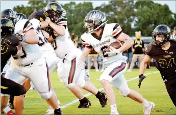  ?? TIMES photograph­s by Annette Beard ?? Blackhawk junior Joe Adams (No. 2) put on a good show running against a very good Tiger rushing defense, carrying the ball 20 times for 70 yards. Adams also scored the game’s first touchdown during the Friday, Sept. 11, game in Prairie Grove.