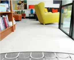  ??  ?? Right: The Wundatherm system from Wunda Group is based on insulated aluminium heating boards, with specificat­ions available to suit a range of floor coverings. The system can achieve rapid response times of as little as 30 minutes