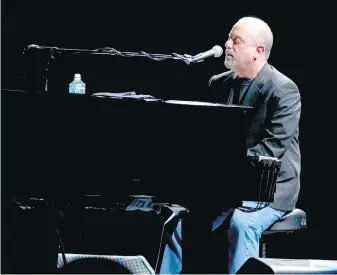  ?? TRIBUNE NEWS SERVICE ?? Billy Joel performs at Madison Square Garden in New York City. More than 1,500 people work at every Joel concert.