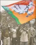  ?? PTI ?? Supporters of the BJP celebrate the party's victory in Gandhinaga­r on Monday