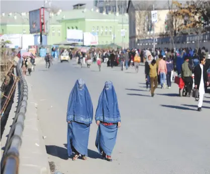  ??  ?? KABUL: In this Monday, Dec 5, 2016 photo, Afghan women walk on a street. — AP