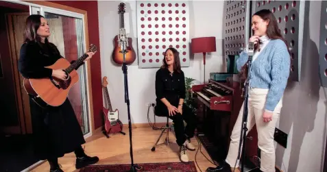  ?? JOEL C YAN/INVISION/AP ?? Members of the folk group The Staves, from left, sisters, Jessica, Emily and Camilla Staveley-taylor appear in a north London recording studio on Feb. 15. The Staves released their third album, “Good Woman,” last month.