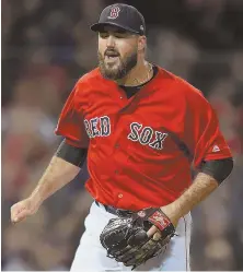  ?? STAFF PHOTO BY CHRISTOPHE­R EVANS ?? WHAT A RELIEF: Brandon Workman shows his excitement after escaping a jam in the sixth inning last