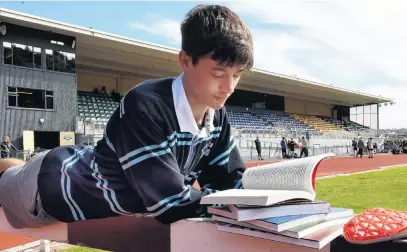  ?? PHOTO: STEPHEN JAQUIERY ?? Brains and brawn . . . King’s High School pupil William Scharpf will be hitting the books and the running track today.