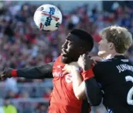  ?? JON BLACKER/THE CANADIAN PRESS ?? TFC’s Jozy Altidore, heading the ball in front of San Jose’s Florian Jungwirth, had two of Toronto’s four goals Saturday.