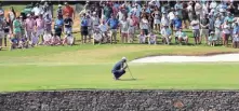  ?? JIM WEBER COMMERCIAL APPEAL ?? Dustin Johnson eyes a putt on the 14th hole during the final round of the 2018 Fedex St. Jude Classic Golf Tournament at TPC Southwind.