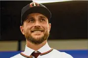  ?? HANNAH FOSLIEN / GETTY IMAGES ?? New Minnesota Twins manager Rocco Baldelli is one of two coaches lured away from the Tampa Bay Rays this offseason. Teams are trying to discover how the franchise wins with such low payrolls.