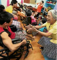  ??  ?? WITH FEELING She may be 82, but Sanchez gamely becomes a child again when she uses music as a universal language to reach out to the differentl­y abled.