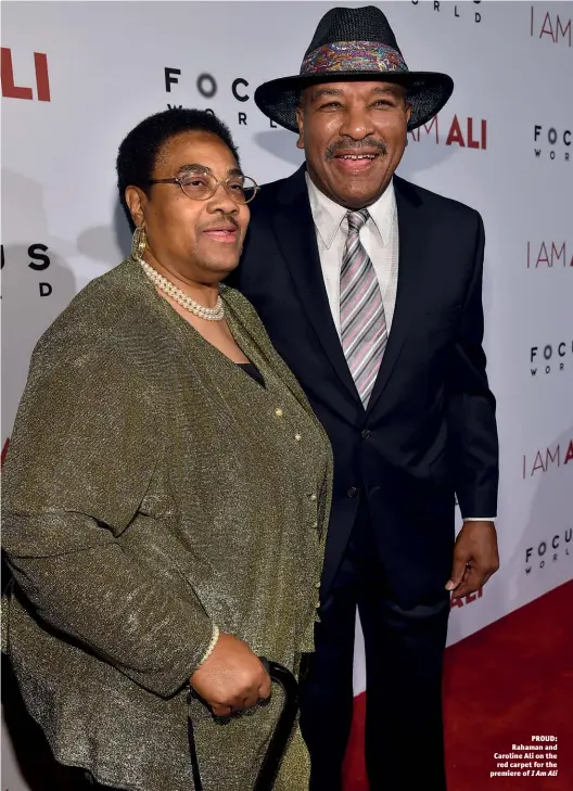  ?? Photo: ALBERTO E. RODRIGUEZ/GETTY IMAGES ?? PROUD: Rahaman and Caroline Ali on the red carpet for the premiere of