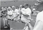 ?? MICHAEL LAUGHLIN/ STAFF PHOTOGRAPH­ER ?? Fort Lauderdale residents attend an anti-flakka outreach campaign at the First Baptist Church of Fort Lauderdale. The event Thursday was designed to raise awareness in the public of the dangers of flakka.