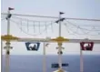  ??  ?? The SkyRide allows passengers to bike the circumfere­nce of the ship from soaring heights.