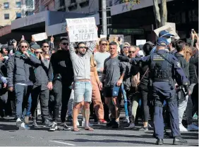  ?? Photo / Getty Images ?? Thousands attended anti-lockdown protests in Sydney.