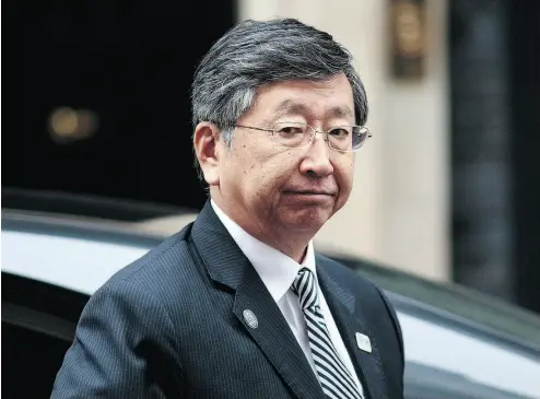  ?? JACK TAYLOR / GETTY IMAGES ?? The Japanese Ambassador to the U.K. Koji Tsuruoka arrives at 10 Downing Street ahead of a roundtable meeting with British Prime Minister Theresa May. Britain trails only the U. S. as a destinatio­n for Japanese investment.